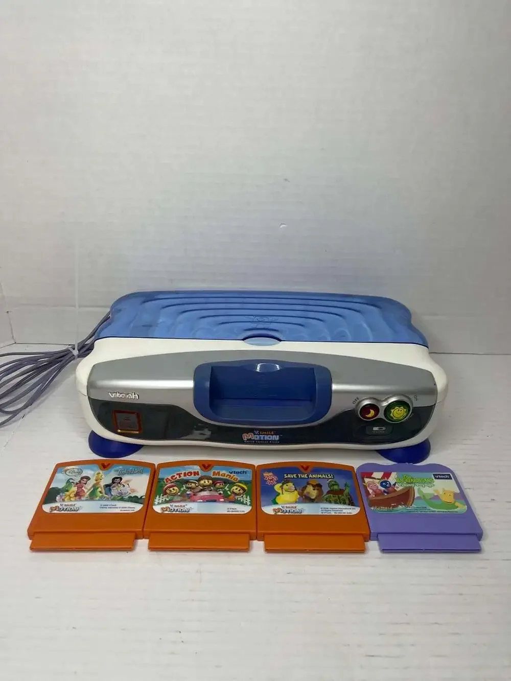 VTech V.Smile Motion Active Learning System Console with 4 Games Read